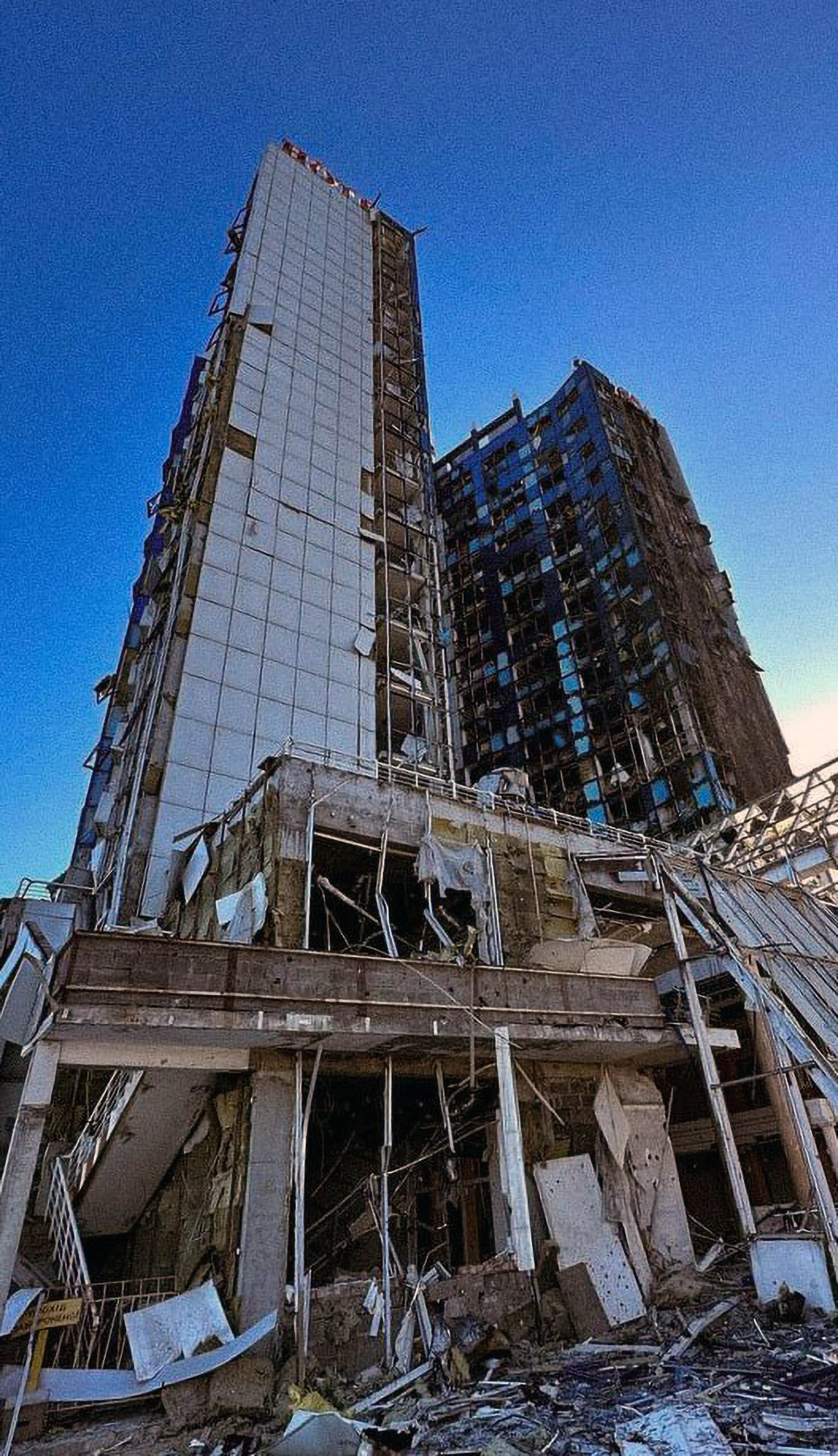 Read more about the article Ukrainian Firefighters Hose Down Destroyed Iconic Odesa Port Hotel After Russian Attack